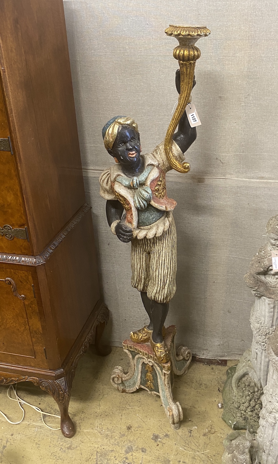 An Italian style carved wood and composition Blackamoor torchere, height 142cm
